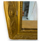 Miroir ancien doré avec des moulures