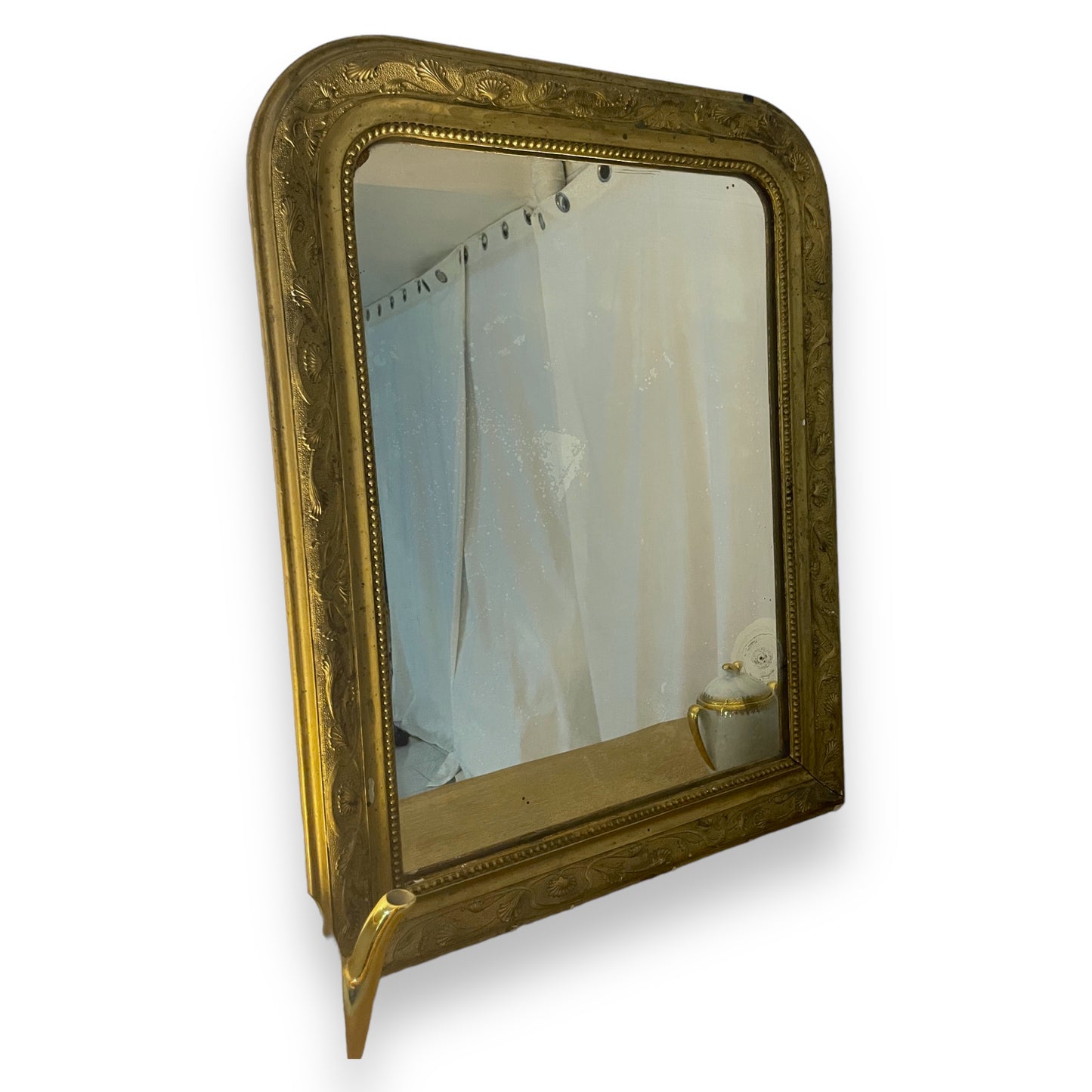 Miroir ancien doré avec des moulures